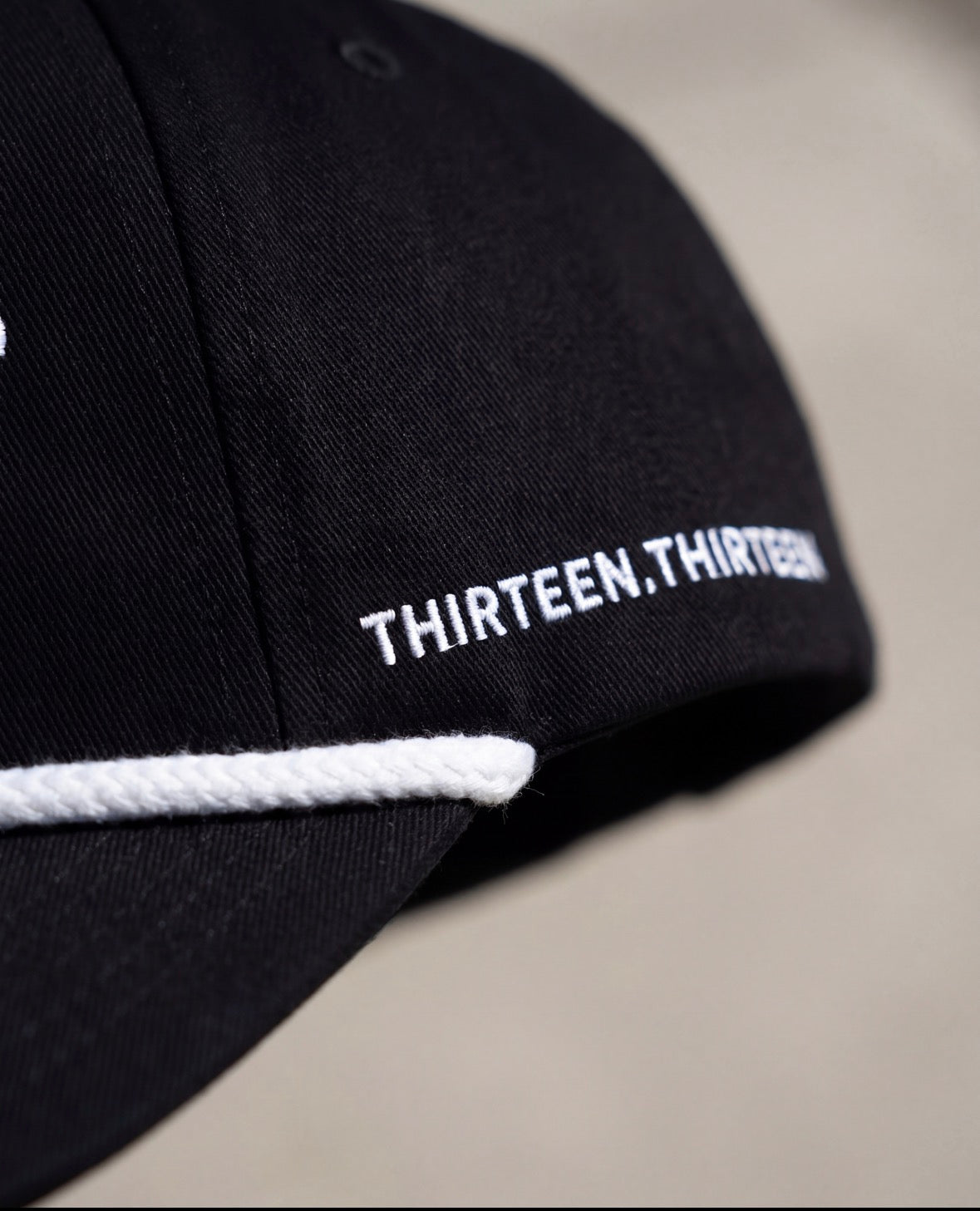 THIRTEEN BLACK CAP
